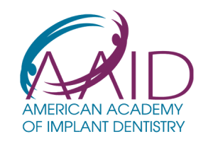 The logo of the AAID which stands for American Academy of Implant Dentistry